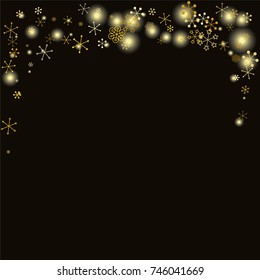 Christmas background with random scatter falling gold snowflakes and yellow blurred lights isolated on black.