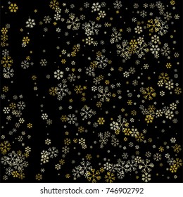 Christmas background with random scatter falling golden snowflakes isolated on black.