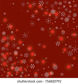 Christmas background with random scatter falling silver snowflakes and red blurred lights on a burgundy background.
