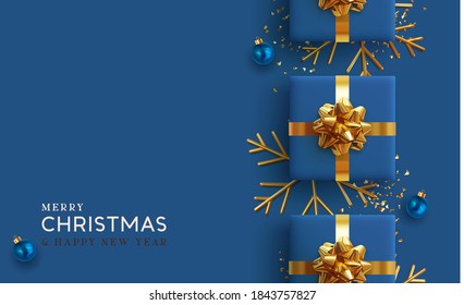 Christmas background. Realistic design with 3d Xmas decoration objects, gift box, bauble ball, gold metal shiny snowflake. glitter confetti. Flatlay top view composition. Greeting card, banner, poster