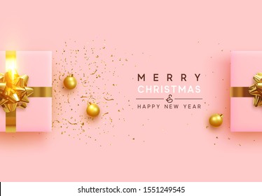 Christmas background. Realistic pink gift boxes, with shiny golden confetti, Xmas balls, decorative baubles. Flat lay, top view. Festive New Year poster, greeting cards, banner
