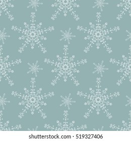 The Christmas background, seamless pattern for wrapping paper. White snowflakes on gray-green background.  