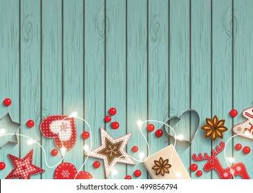 Christmas background, small scandinavian styled red decorations iluminated by electric decorative lights lying on blue wooden desk, inspired by flat lay style, vector illustration, eps 10 with