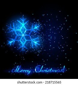 Christmas background with snow and big glowing snowflake. In dark blue colors