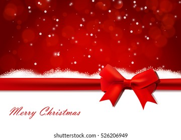 Christmas background with snow and red bow.