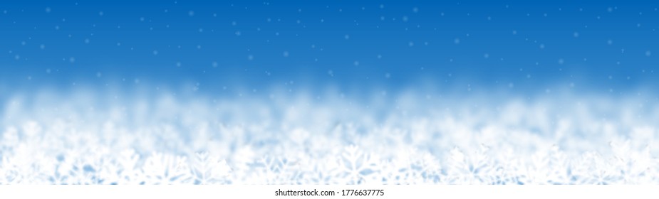 Fondo navideño de copos de nieve de diferente forma, borrosidad y transparencia, situado abajo, sobre fondo azul claro