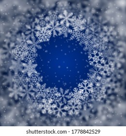 Christmas background of snowflakes of different shape, blur and transparency, arranged in a circle, on blue background