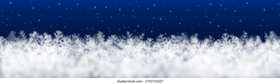 Christmas background of snowflakes of different shape, blur and transparency, located bottom, on blue background