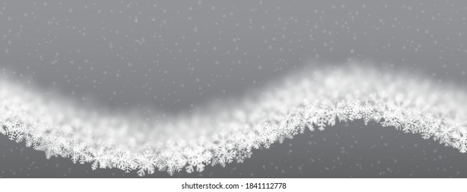 Christmas background of snowflakes of different shape, blur and transparency, wave shaped, on gray background