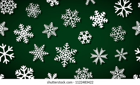 Christmas background of snowflakes of different shapes and sizes with shadows. White on dark green.