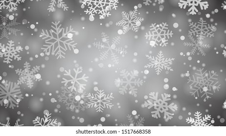 Fondo navideño de copos de nieve de diferentes formas, tamaños y transparencia en colores gris y negro
