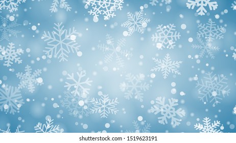 Christmas background of snowflakes of different shapes, sizes and transparency in light blue colors