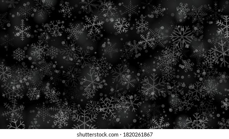 Christmas background of snowflakes of different shapes, sizes and transparency in gray and black colors