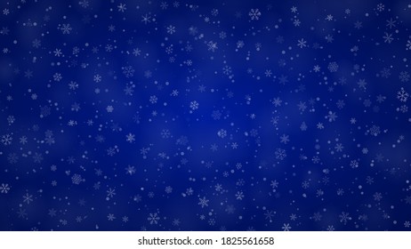 Christmas background of snowflakes of different shapes, sizes and transparency in blue colors