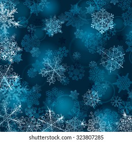 Christmas background with snowflakes in light blue colors