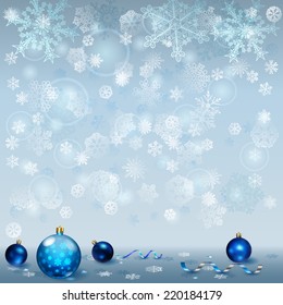 Christmas background with snowflakes and several balls