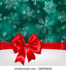 Christmas background with snowflakes in turquoise colors and big red bow with horizontal ribbons