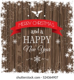 Christmas background with snowy border and a wooden texture