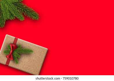 Christmas background with spruce branches and gift box. Vector top view illustration.