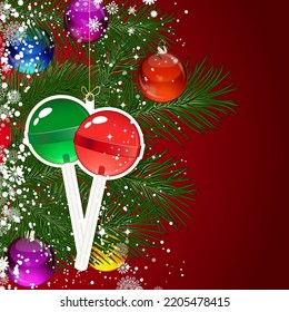 Christmas background with Christmas tree branches decorated with glass balls and toys.
