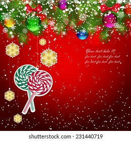 Christmas background with Christmas tree branches decorated with glass balls and toys.