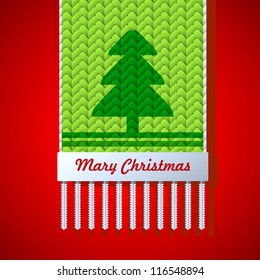 Christmas background. Christmas tree is shown in a knitted scarf. Christmas card.