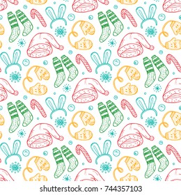 Christmas background. Vector Xmas Seamless pattern. Doodle Christmas festive clothes. Santa hats, socks, mittens. Holiday wallpaper.