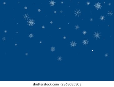 Christmas background. White delicate snowflakes on a blue background. New Year's holiday design