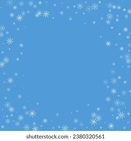 Christmas background. White delicate snowflakes on a blue background. New Year's holiday design
