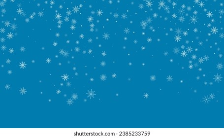 Weihnachtshintergrund. Weiße, feine Schneeflocken auf blauem Hintergrund. Weihnachtsdesign