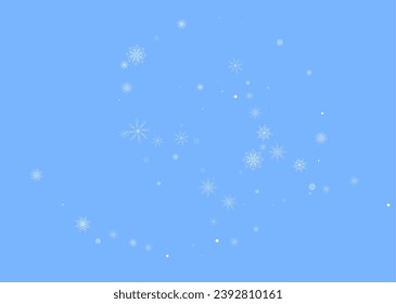 Christmas background. White delicate snowflakes on a blue background. New Year's holiday design