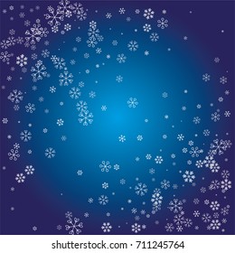 Christmas background with white random scatter falling snowflakes on a navy blue background.