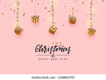 Christmas background. Xmas design hanging from light garland with realistic gift boxes strewn with golden confetti. Handmade calligraphic lettering text Merry Christmas and Happy New Year.