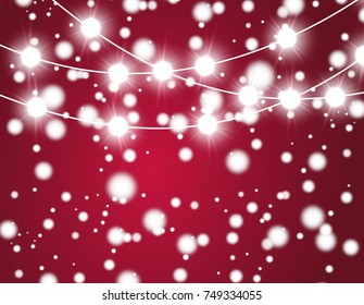 Christmas background with xmas lights. Vector glowing garland isolated on red background with shine particles. Vector