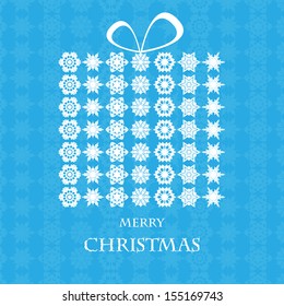Christmas background.Gift box made of white snowflakes on a blue background.abstract box of snowflakes.vector