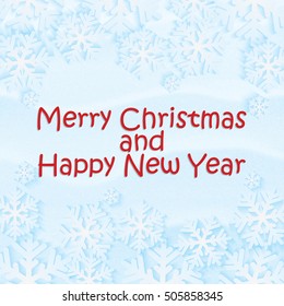 Christmas background.White snowflakes on blue background.Background for New Year's greetings.Winter abstraction