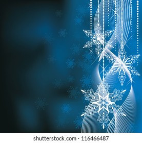 Christmas backround in blue colors with snowlakes.