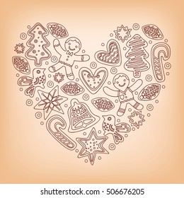Christmas baking concept. Heart shape formed by various gingerbread figures featuring candy canes, christmas trees, holly, stars, bells, doves and hearts.