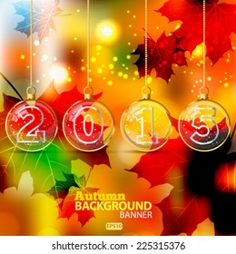 christmas ball 2015 year. Autumn background blur of yellow, red color 