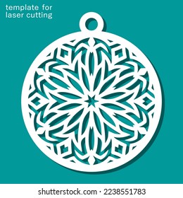 Christmas ball with a carved pattern. Decorative round decoration with snowflake for the New Year. Template for plotter laser cutting of paper, wood carving, metal engraving, cnc. Vector illustration.