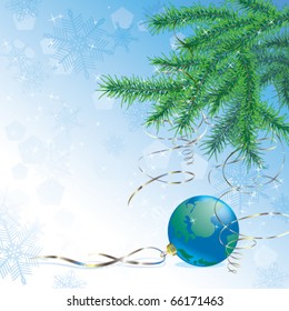 Christmas ball in form of the globe and spruce branches