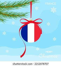 Christmas ball with the France flag, decorates the Christmas tree branch. Illustration of a Christmas ball with the flag of France in a Christmas tree branch on a beautiful winter background. Vector 