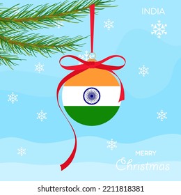 Christmas ball with the India flag, decorates the Christmas tree branch. Illustration of a Christmas ball with the flag of India in a Christmas tree branch on a beautiful winter background. Vector 