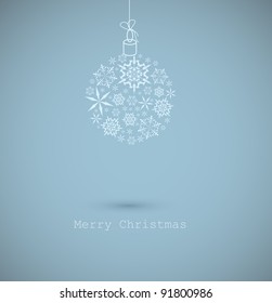 Christmas ball made from light snowflakes on blue background - Christmas card