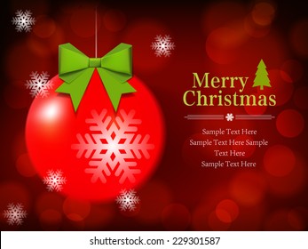 Christmas Ball on defocus shiny background with space for your text