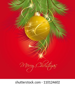 Christmas ball on green spruce branch
