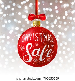 Christmas ball on shiny bokeh background