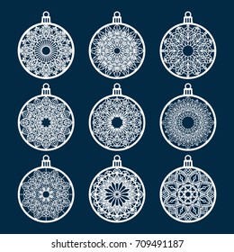 Christmas ball set with snowflake. Laser Cutting template for greeting cards, envelopes, invitations, interior elements. Vector xmas paper cutting ornamental panel. Die cut card.