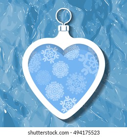 Christmas ball in the shape of a heart and snowflakes.Blue.