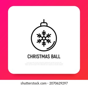 bola de Navidad con un icono de línea delgada copo de nieve. Ilustración vectorial moderna.